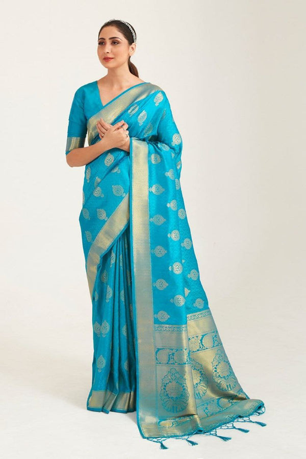A symbol of grace and cultural heritage, the saree drapes elegance in every fold.