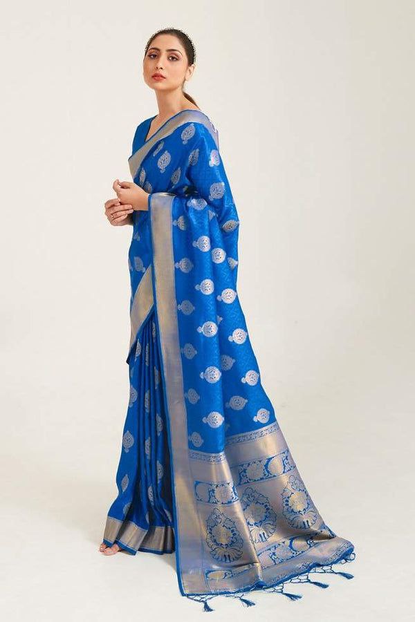 A symbol of grace and cultural heritage, the saree drapes elegance in every fold.