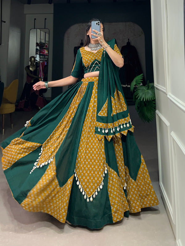 Step into the Festive Season with a Mustard & Green Cotton Chaniya Choli: Plain with Printed Kali and Beautiful Cowrie (Kodi) Work – Embrace the Joy and Elegance of Navratri! 🦚