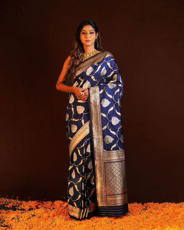 THE BANARASI SAREE PRESENTED BY AAYNA IS MADE UP OF SILK THREADS WOVEN USING INTRICATE TECHNIQUES. SAREES WITH HEAVY BROCADE WORK AND GOLD  ZARI WORK ARE ITS MOST STRIKING FEATURES